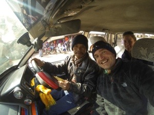 With the cool taxi driver as he took a break from turning the wheel!